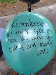 green balloon remembering gone too soon