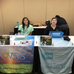 two women smiling VSS table