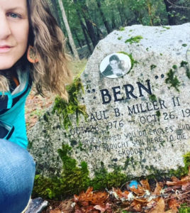 woman beside gravestone Bern